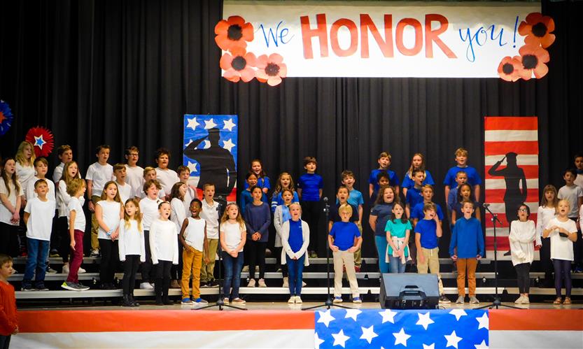 Students sing in Veterans Day performance